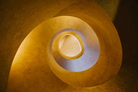 Top view of abstract background of spiral unusual element in dim yellow light